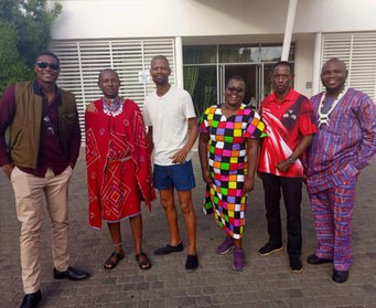 Leonard Mukosi with Indigenous delegates at a convening